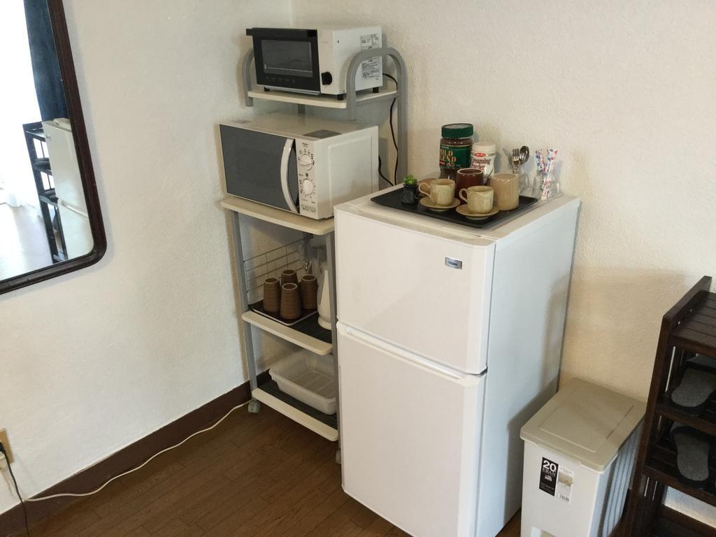 Pension Sea Shells Мотобу Экстерьер фото